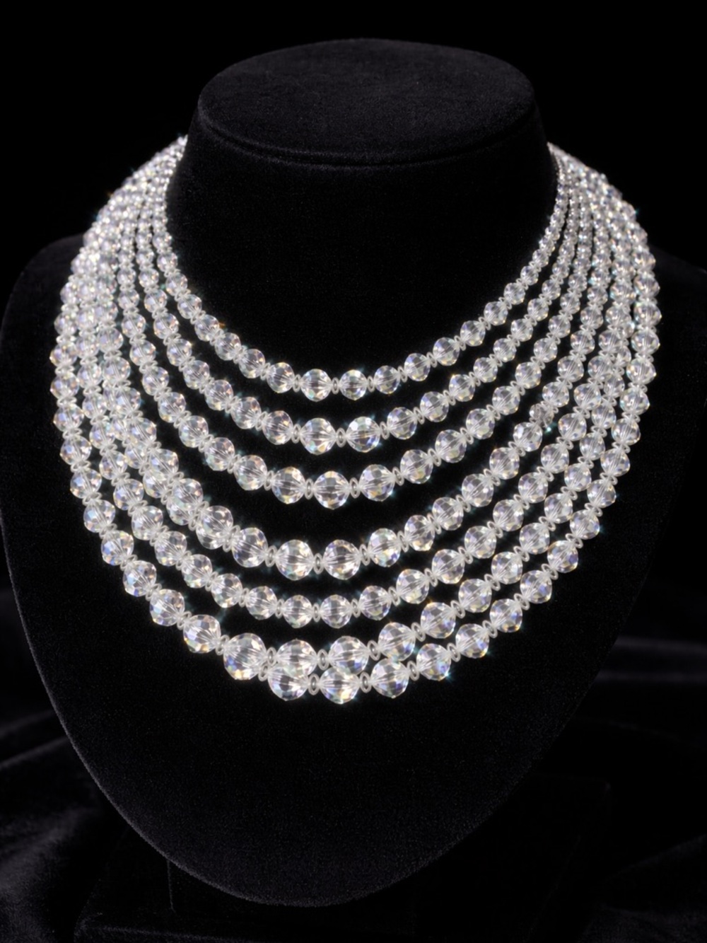 Vintage aurora borealis crystal necklaces (2) and wrap bracelet.